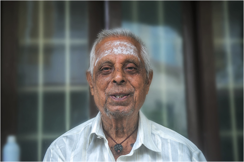 Asian grandfather spending quality time with family at home