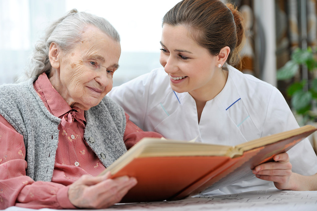 Caregiver providing attentive care in a residential care home setting