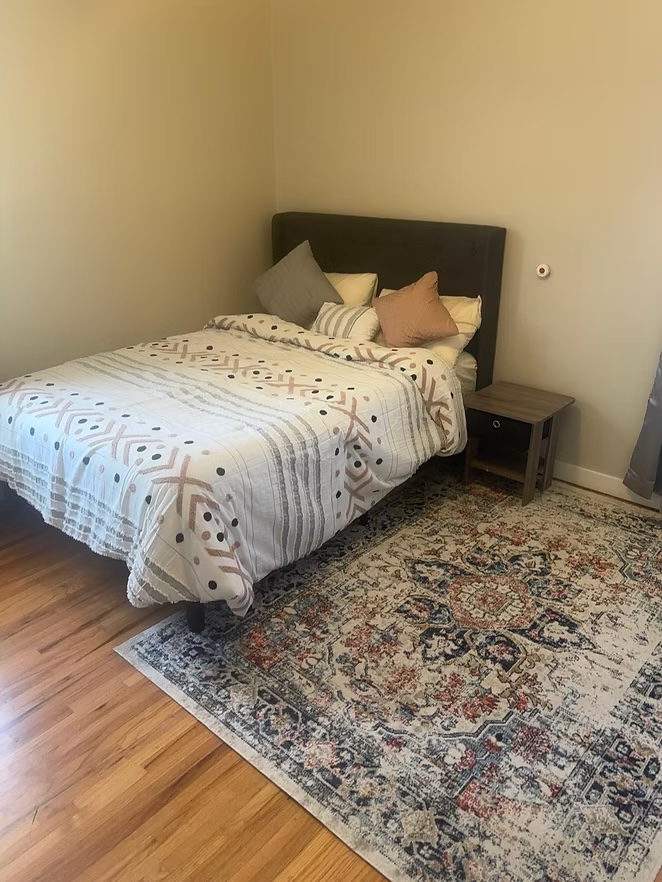 Private bedroom with white bedding